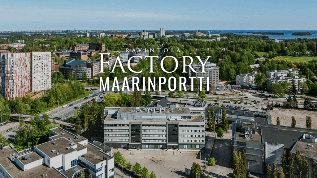 Maarinportti toimitilakiinteistön ilmakuva, jossa on pääläl teksti Factory Maarinportti.