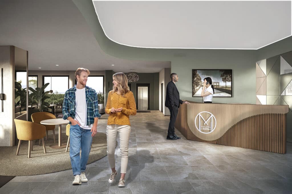 Havainnekuva Maarinportin aulatilasta, jossa on vastaanottotiski.